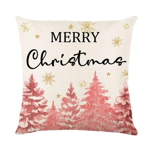Pink reindeer Christmas pillow case with trees and gold snowflakes on white linen background