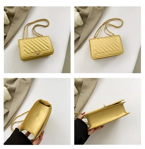 Detailed views of gold quilted crossbody bag with metal chain strap and turn-lock closure
