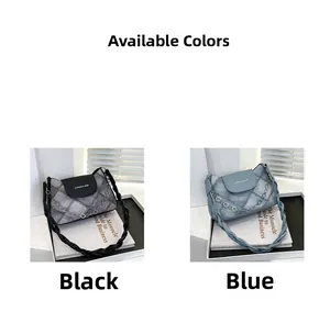 Fashionable hobo bags in black and blue patchwork denim with floral chain detail