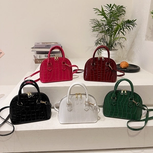 Women shell handbags in crocodile pattern with top handles and shoulder straps in five colors