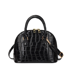 Elegant black crocodile-pattern shell bag with dual gold zippers and adjustable strap