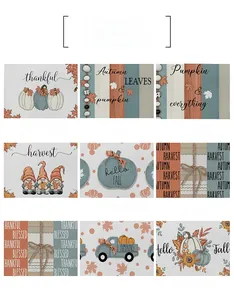 Detail showing nine autumn-themed placemat designs with pumpkin and gnome patterns