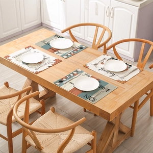 Set of 4 waterproof fall placemats with pumpkin and maple leaf patterns for home dining decor