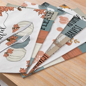 Set of 4 waterproof Thanksgiving placemats with pumpkin and sunflower autumn patterns