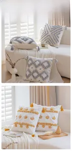 Detail of Nordic tufted pillow covers with geometric patterns and tassel accents