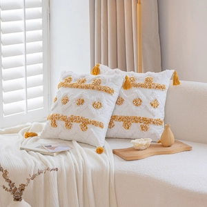 Nordic tufted throw pillows with yellow geometric patterns and tassels for sofa decor