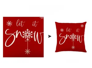 Détail de la taie d'oreiller de Noël rouge avec let it snow blanc et motifs de flocons
