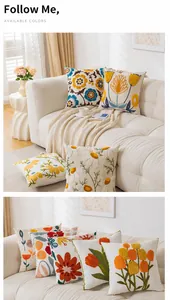 Detail shot of textured cushion cover featuring colorful 3D floral tulip and daisy embroidery