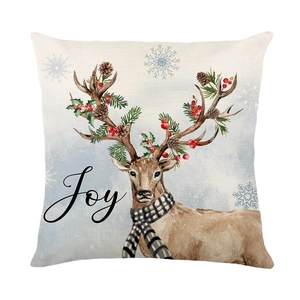 Christmas reindeer throw pillow cover with Joy text and watercolor snowflake design