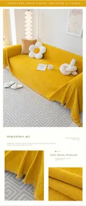 Detail view of yellow chenille sofa cover showing soft texture and fringe edges