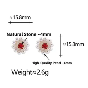 Detail of floral earring with 4mm red stone and pearls, measuring 15.8mm in diameter