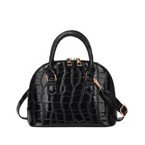 Glossy black crocodile-embossed shell handbag with gold hardware and top handles