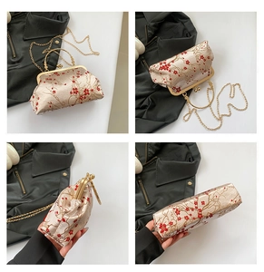Detailed views of vintage silk embroidered bag with red plum blossoms and gold chain