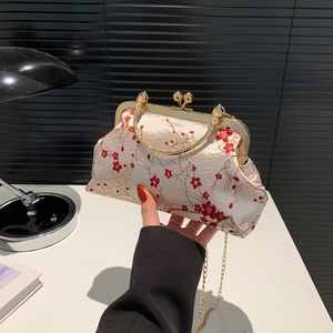 Elegant gold satin evening bag with red plum embroidery and metal chain strap