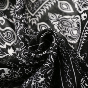 Macro detail of classic paisley pattern and cotton fabric texture on a bohemian scarf