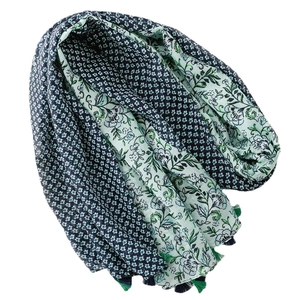 Linen feel floral scarf in navy and green with fringe tassels and botanic prints
