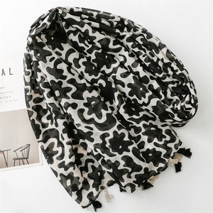 Black and white linen texture scarf with abstract wave patterns and fringe tassels