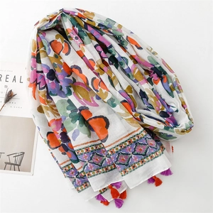 Linen feel cotton scarf with colorful floral watercolor print and orange tassels