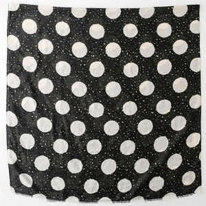 Polka dot cotton linen scarf in black and white with gold stamping and fringe details