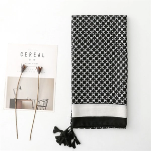 Minimalist black and white geometric pattern scarf with stylish fringe trim details