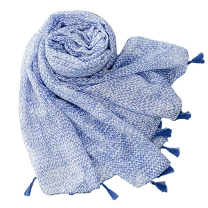 Blue herringbone print cotton linen scarf with tassels shown in a curled pile
