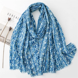 Blue and white geometric plaid scarf with tassels in soft cotton linen texture