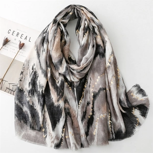 Linen feel scarf with gold foil hearts and mountain pattern print on white background