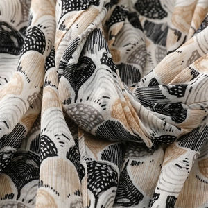 Macro shot of breathable cotton linen blend scarf with abstract shell geometric print