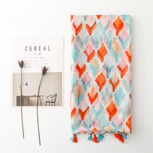 Colorful geometric diamond print summer scarf with fringe detail for sun protection