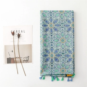 Ethnic blue and green mandala patterned scarf with handmade tassels for summer travel