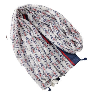 Écharpe style marine avec motifs de poissons rouges et bleus et détails de glands