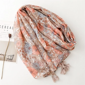 Floral print cotton scarf with silver silk thread and tassels in warm pink tones