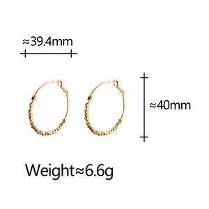 Tabella taglie dettagliata per orecchini a cerchio dorati con diametro 40mm e peso 6,6g