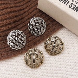 Retro hollow geometric round stud earrings in gold and silver with woven texture finish