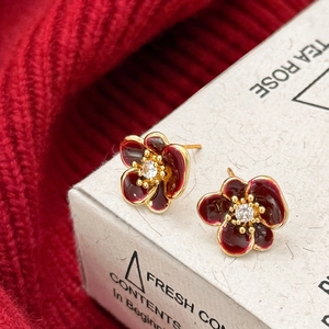 Red flower stud earrings with gold-plated metal and center zircon crystal accent