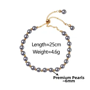 Detailed view of grey pearl bracelet with gold beads and adjustable sliding clasp