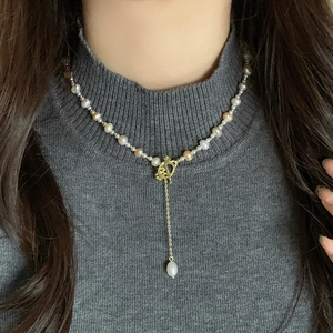 Elegant natural freshwater pearl necklace with gold OT toggle clasp and Y-shaped pendant