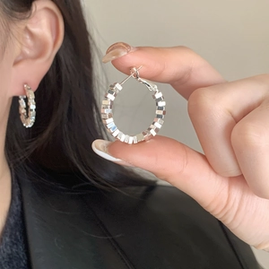 Silver geometric square block hoop earrings shown on model for modern minimalist style
