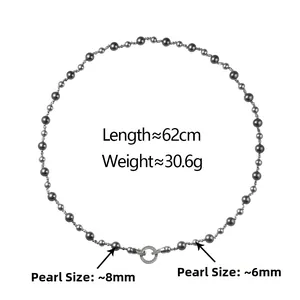 Detail of 62cm long grey pearl necklace with 8mm/6mm beads and crystal pavé ring clasp