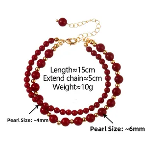 Bracelet double couche en perles rouges avec perles dorées et breloque cœur