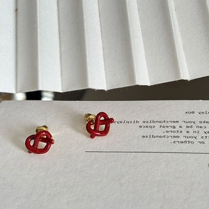 Elegant red enamel knot heart studs with gold plating for a festive vintage style