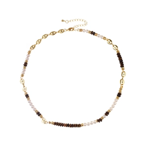 Maillard style tiger eye beaded necklace with pearls and coffee bean links on white backdrop