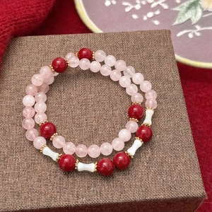 Handgefertigtes Naturstein-Perlenarmband im Vintage-Stil mit rosa Kristall und Goldakzenten