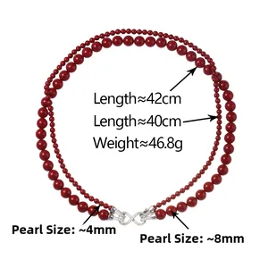 Collar de doble capa con perlas rojas y cierre de infinito plateado con medida de 40-42 cm