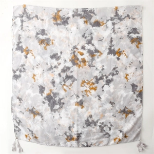 Cotton-linen feel gray scarf with ink wash print, yellow accents and tassel fringe details