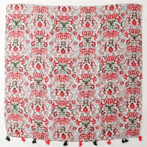 Floral print cotton-linen scarf with red and green tassels in bohemian style