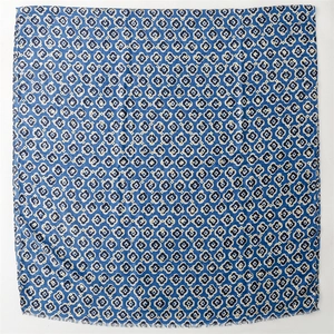 Detailed view of dark blue cotton-linen feel scarf with vintage floral patterns and tassels
