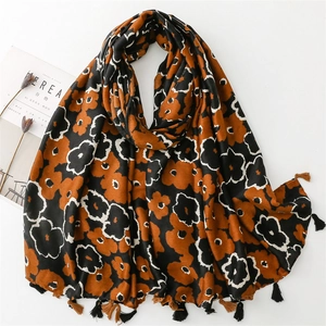 Floral cotton linen scarf with black orange patterns and tassels for autumn winter fashion