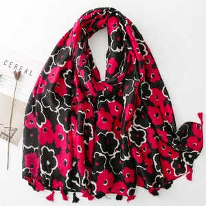 Linen-feel cotton scarf with red and black poppy flower patterns and tassel edges