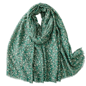 Dark green cotton-linen scarf with golden leaf patterns and frayed edges on white background